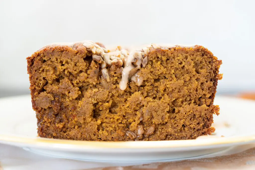 Piece of Moist Gluten Free Pumpkin Bread with Maple Icing
