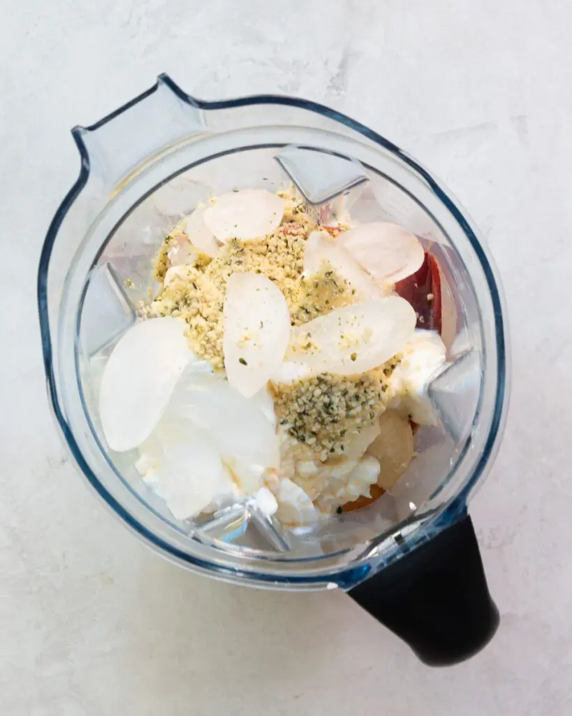 Ingredients for Peach Banana Gut Health Smoothie in a Blender