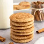 Stack of Gluten-Free Snickerdoodle Cookies with Milk and Cinnamon Sticks