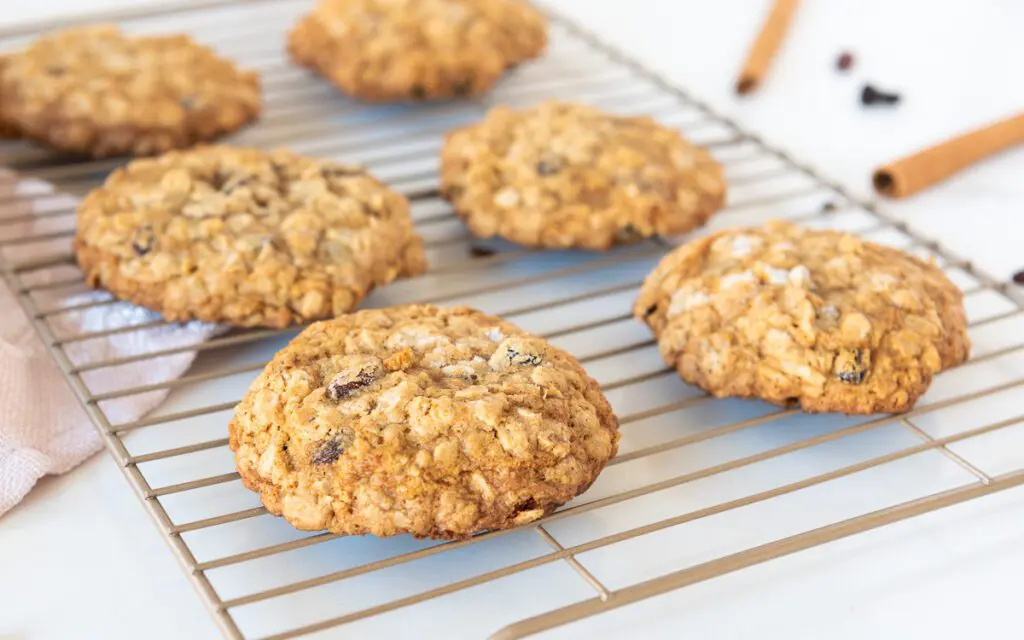 Wire rack of gluten-free oatmeal raisin cookies
