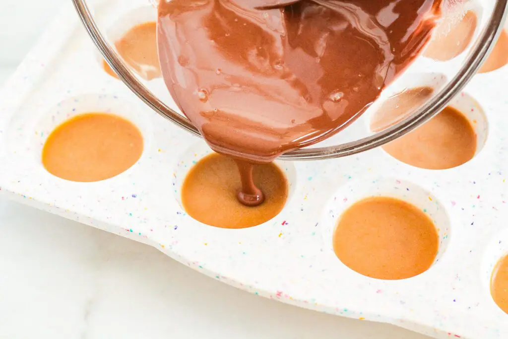 Pouring Chocolate into Silcon Molds