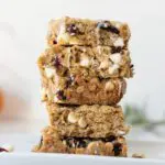 Tall stack of White Chocolate Cranberry Oatmeal Cookie Bars