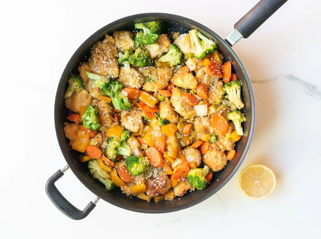 Mix Veggies with Chicken in large skillet.