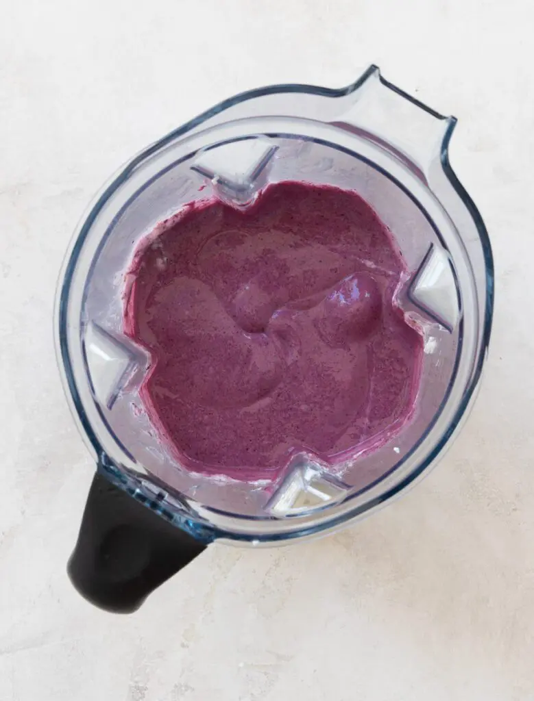 Blender full of blueberry smoothie