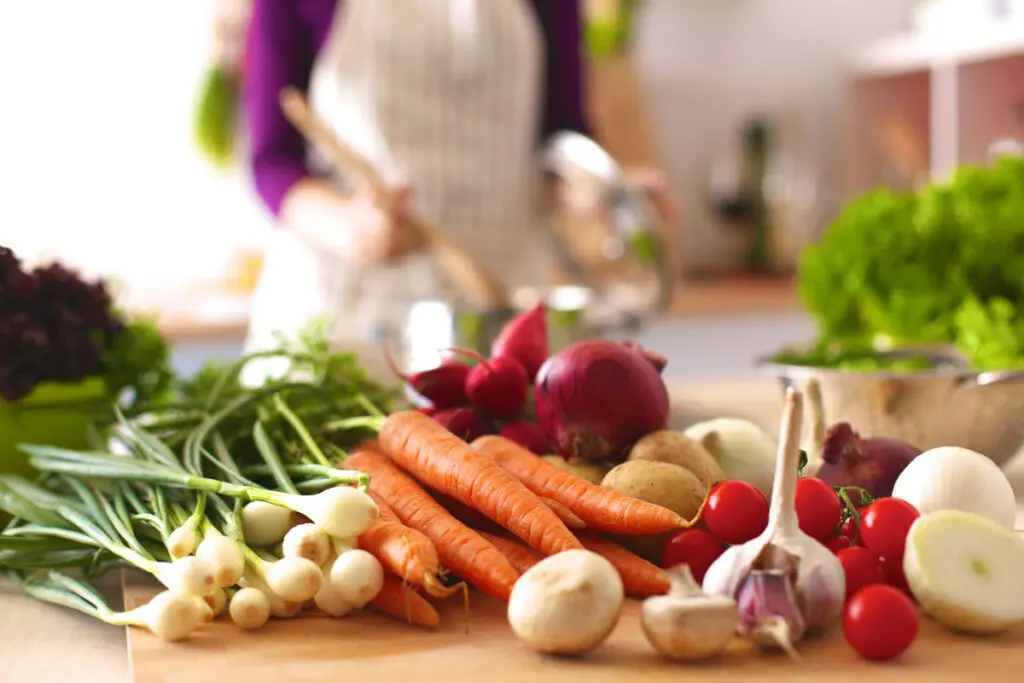Table with colorful root vegetables