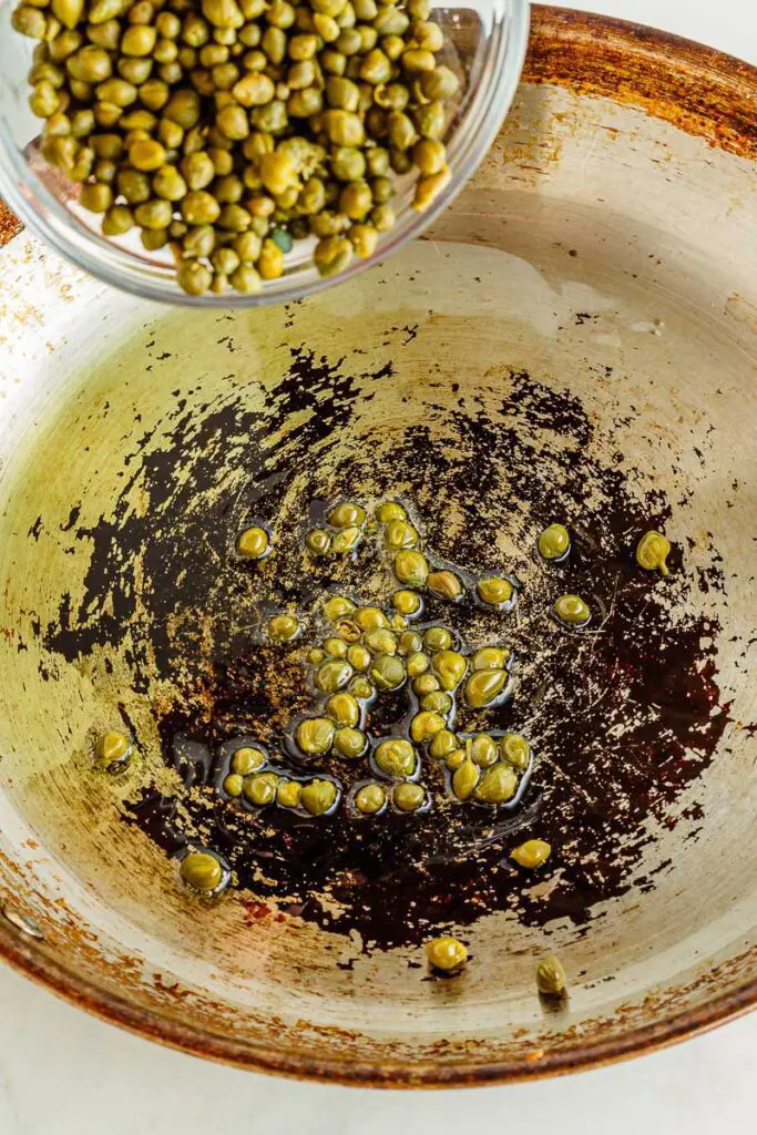 Saute the capers