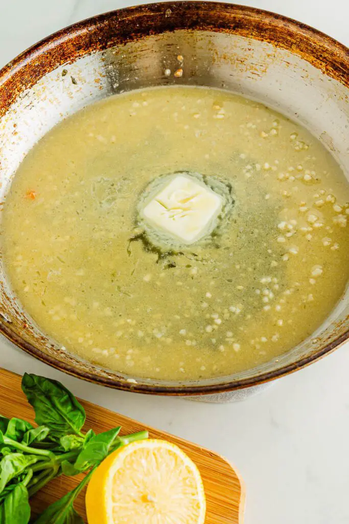 Add white wine and butter