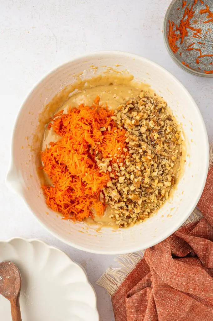 Add Grated Carrots to carrot cupcake batter