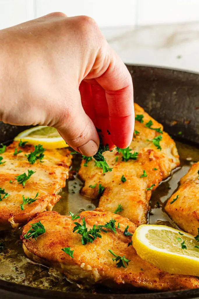 Add chicken piccata to pan of butter and lemon.