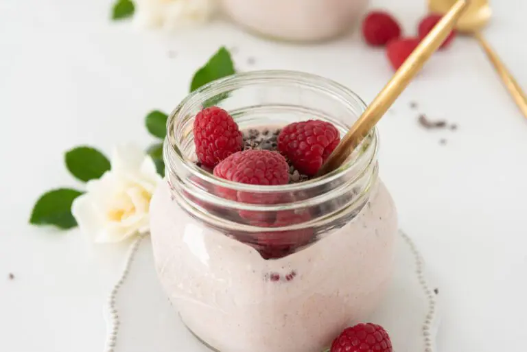 Overnight Oats with protein Powder and Raspberries.