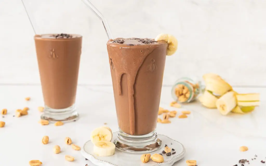 Glass of peanut butter protein smoothie.