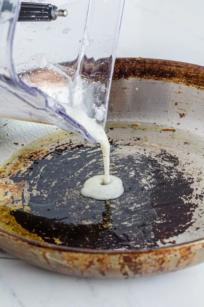 Pour egg whites into pan