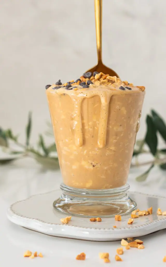 Spoon in peanut butter overnight oats
