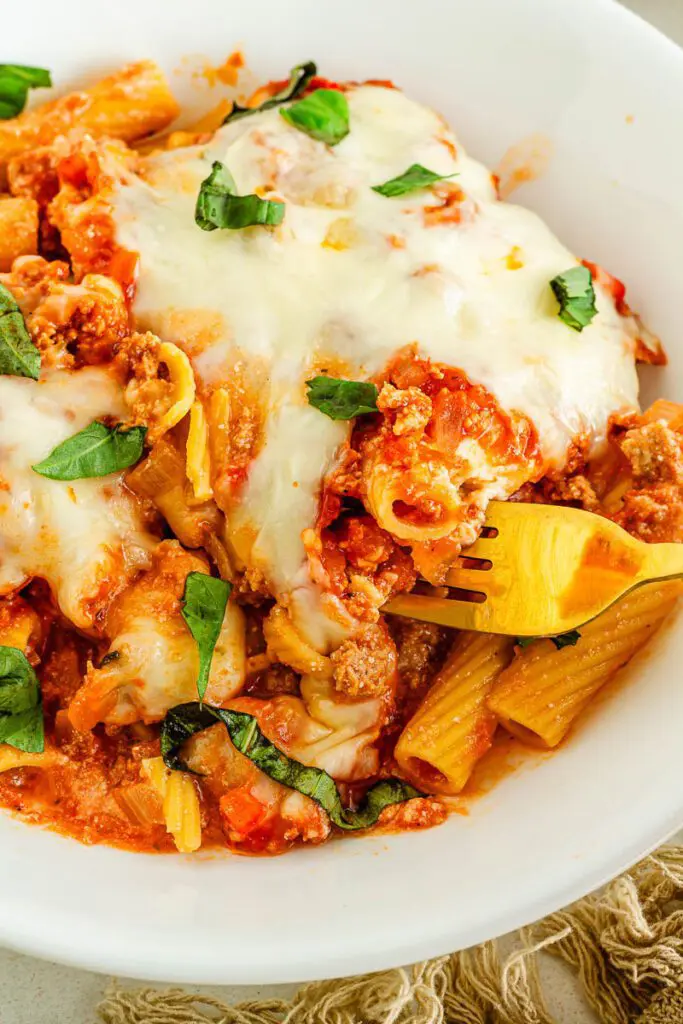 Bowl of gluten free baked pasta with turkey meat sauce