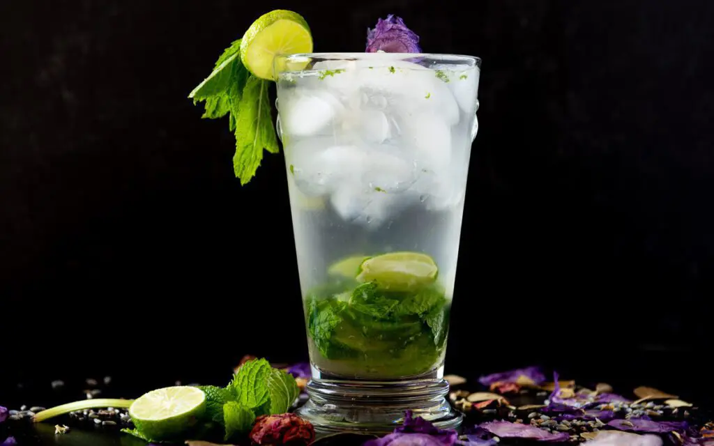 Beautiful Lavender Mojito Mocktail with Limes, Mint and Flowers
