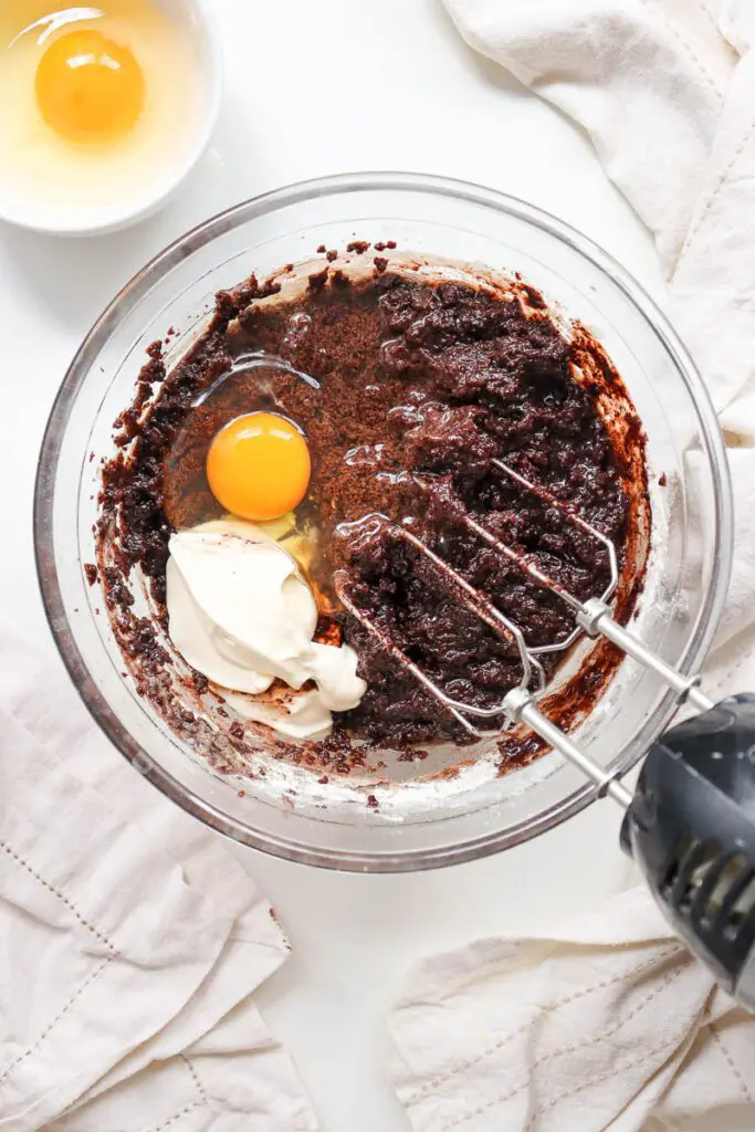 Mix in Eggs and Sour Cream