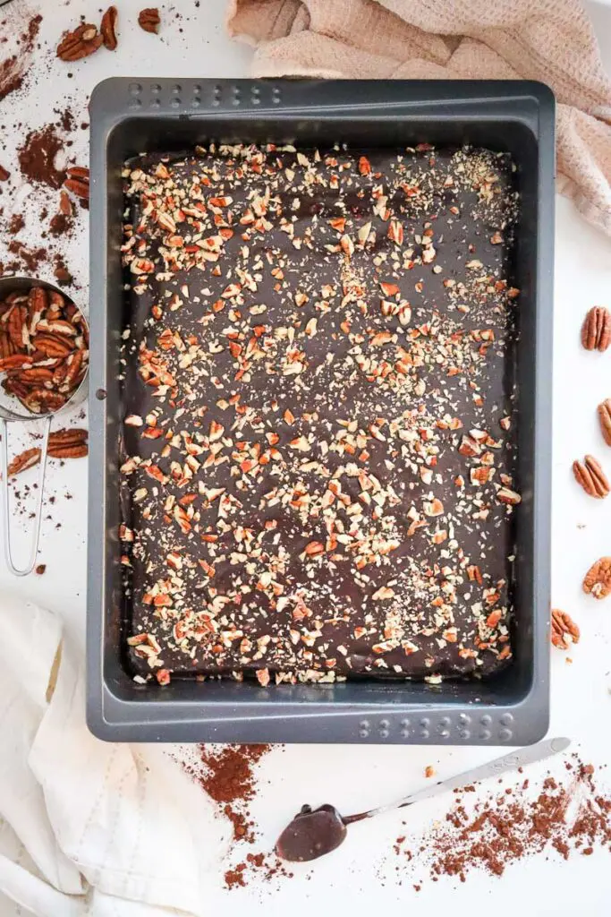 Sprinkle Pecans on Cake