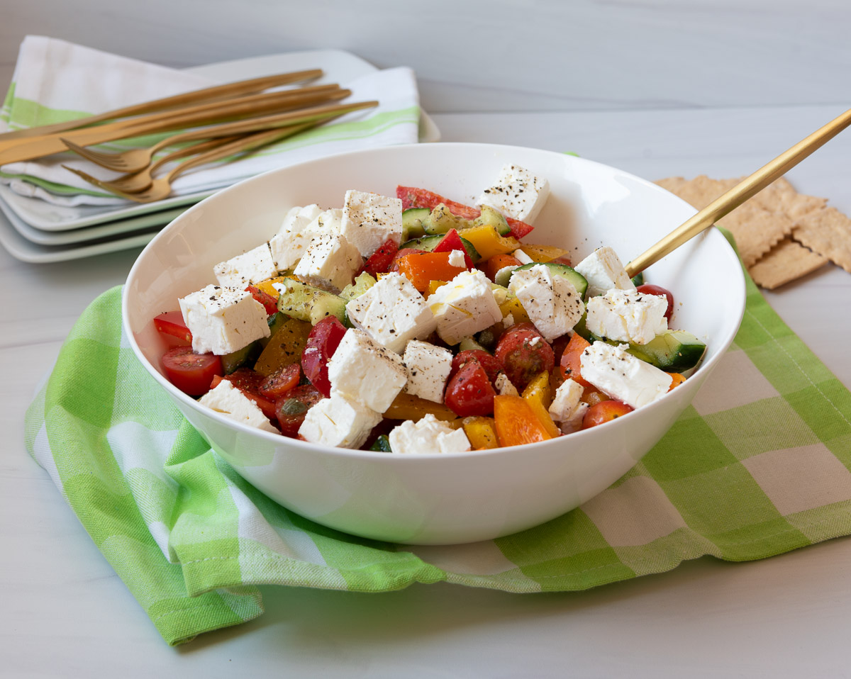 Greek Salad with feta, tomatoes, cucumbers and red, yellow and orange peppers! 