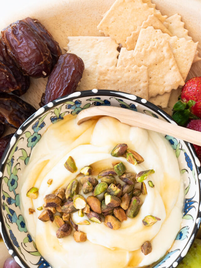 Creamy whipped ricotta with honey and chopped pistachios surrounded by dates, figs and fresh fruit!