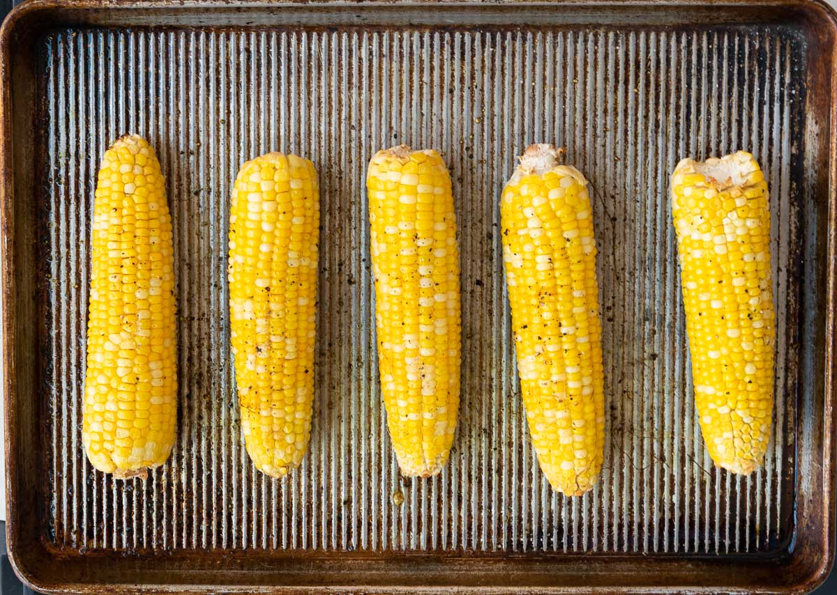 5 Ears of Oven Roasted Corn on a Baking Tray 