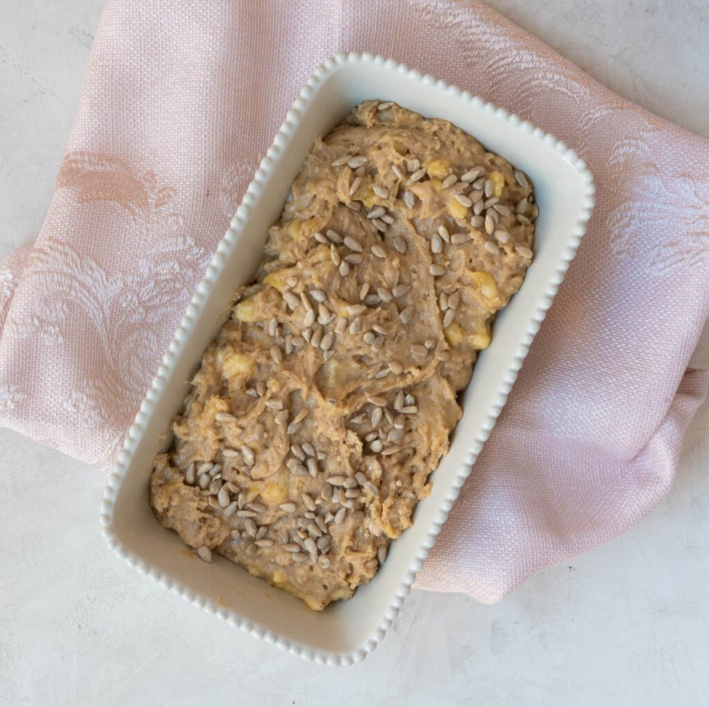 Quick Bread Batter in Ceramic Loaf Pan with Pink Napkin 