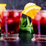 Pomegranate Mocktail with Oranges and Limes