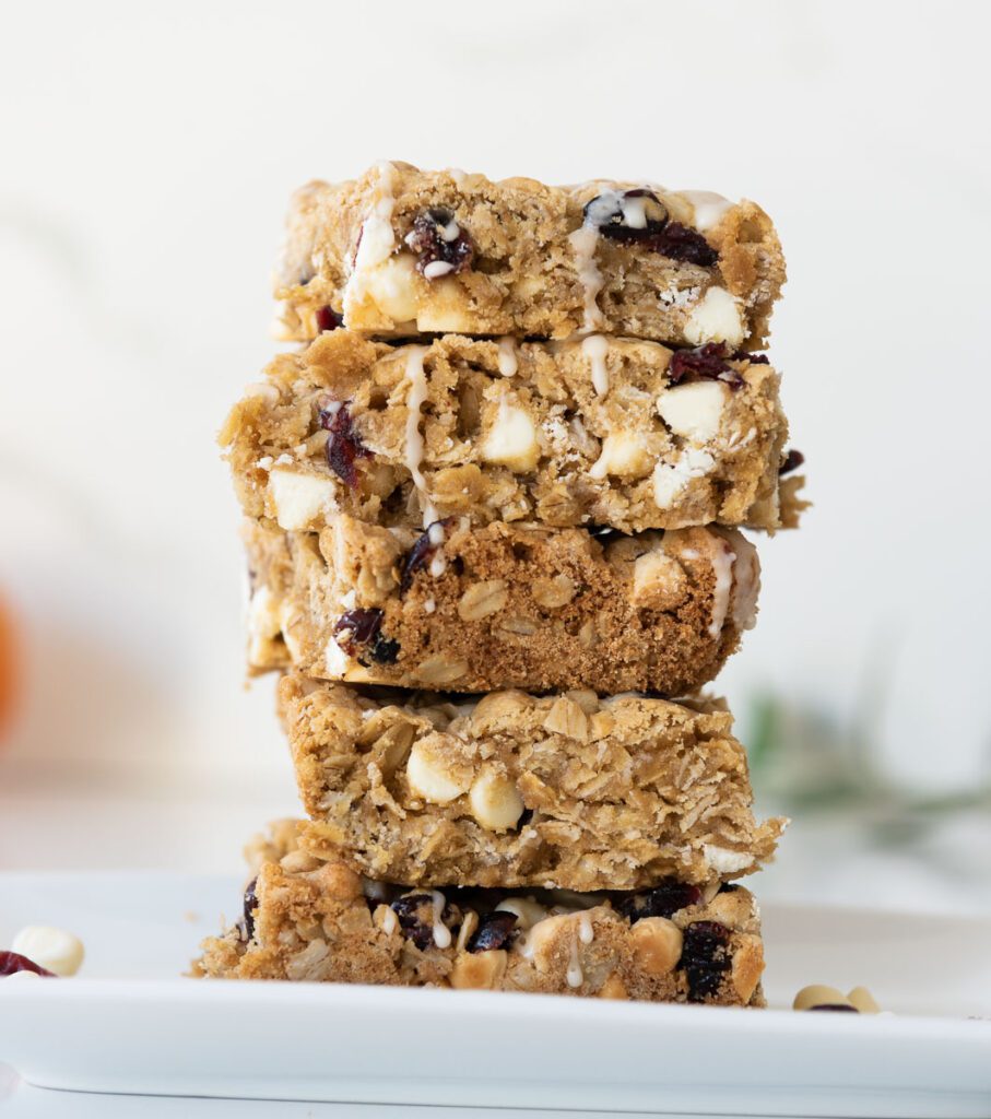 Tall stack of White Chocolate Cranberry Oatmeal Cookie Bars