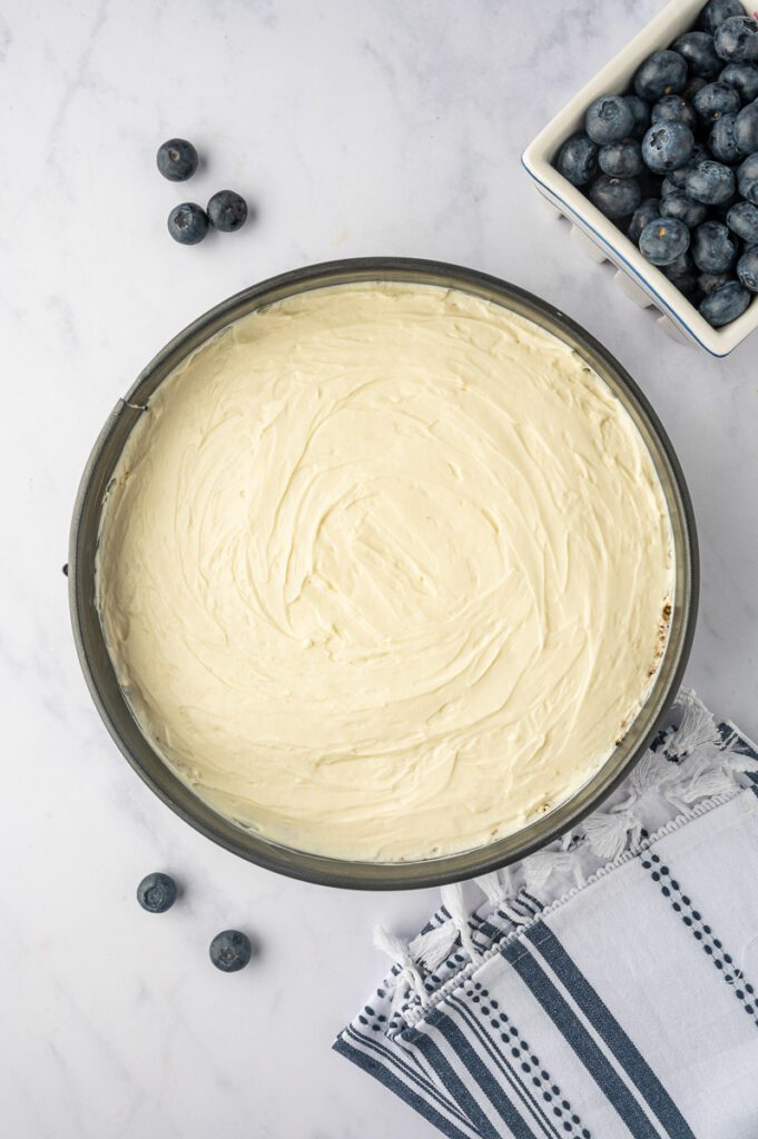 Spread Cheesecake mixture into prepared pan 