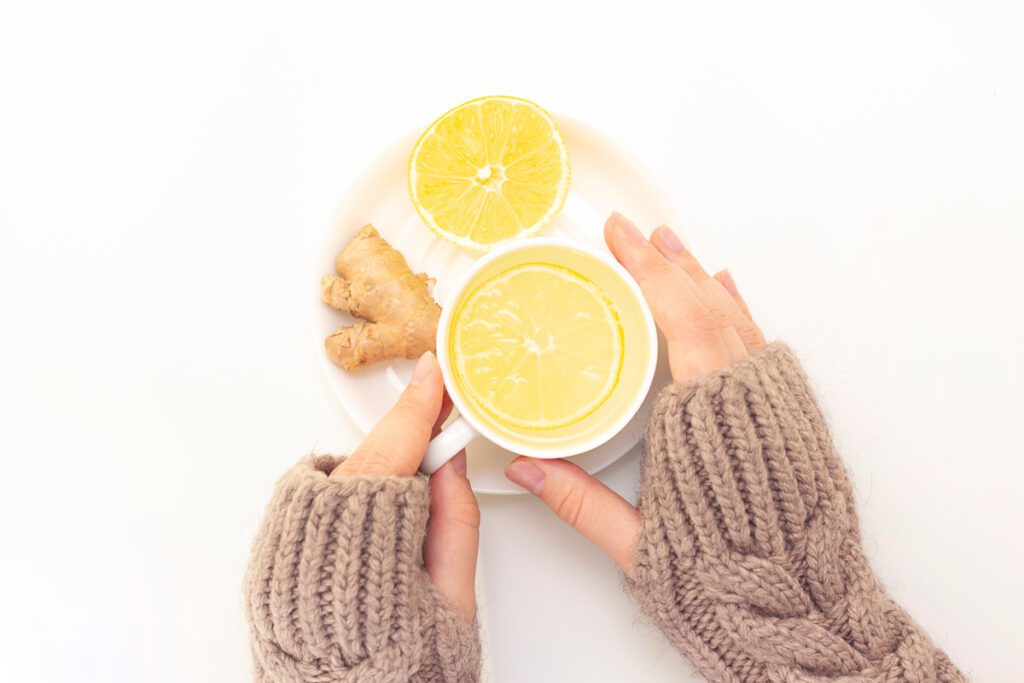 Hands holding Ginger Tea
