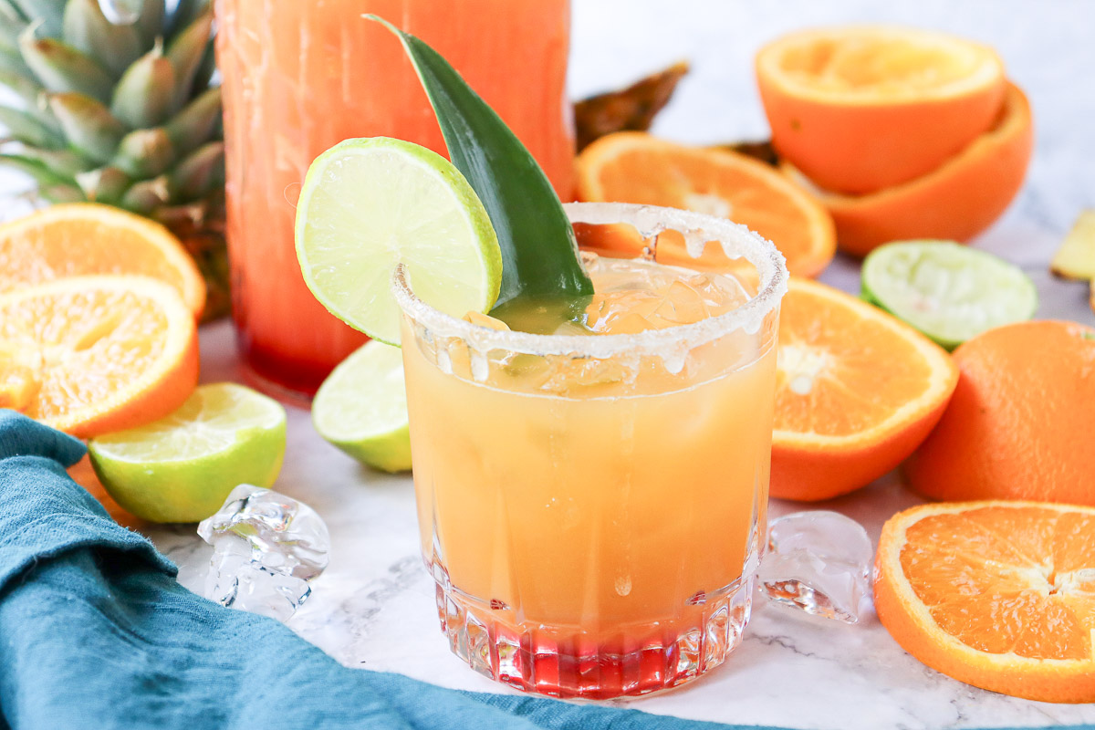Tequila Sunrise Mocktail with slices of citrus 