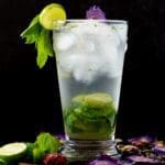 Beautiful Lavender Mojito Mocktail with Limes, Mint and Flowers